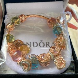 Authentic Pandora rose gold bracelet charms